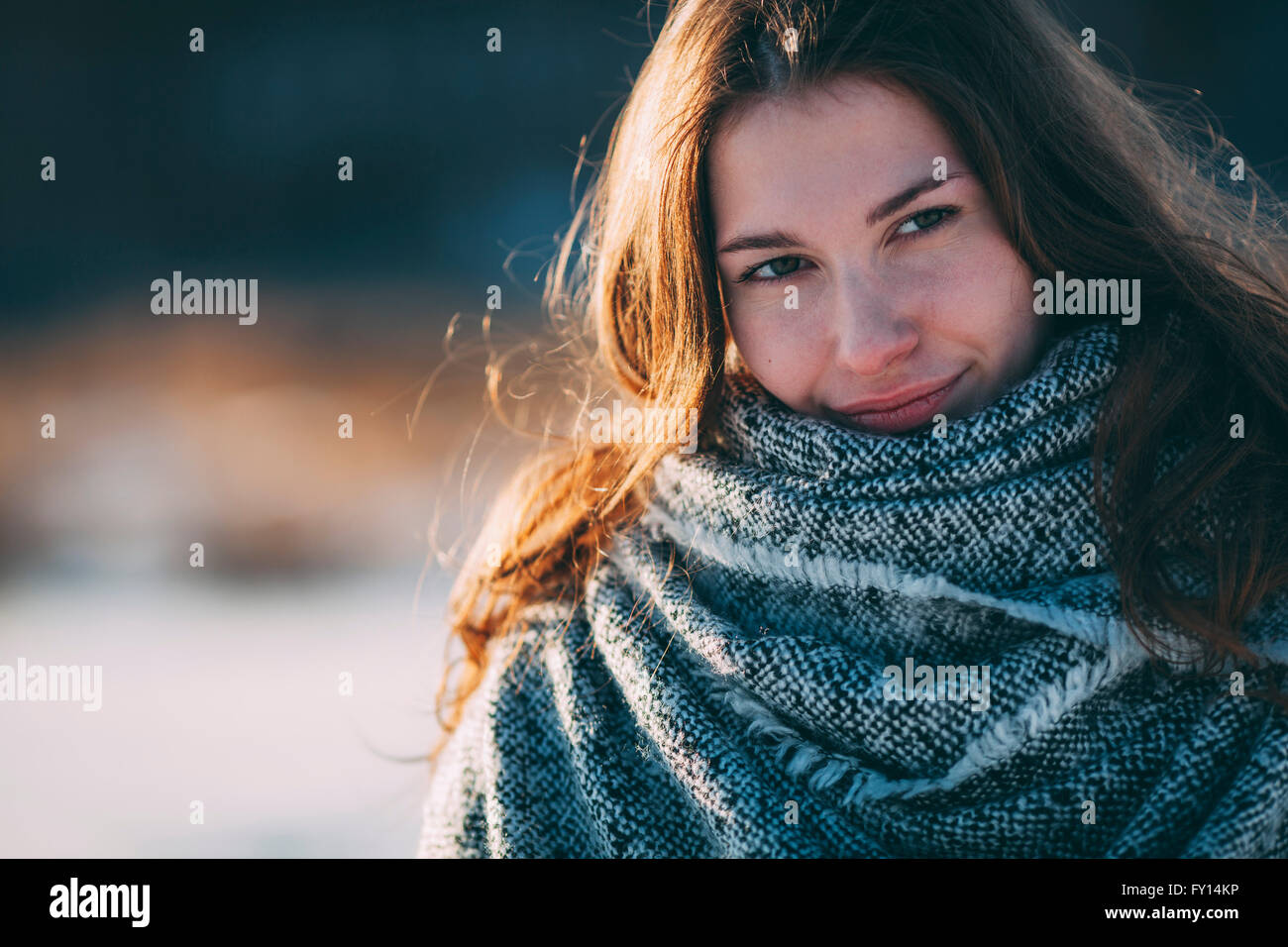 Close-up portrait of young beautiful woman during winter Stock Photo