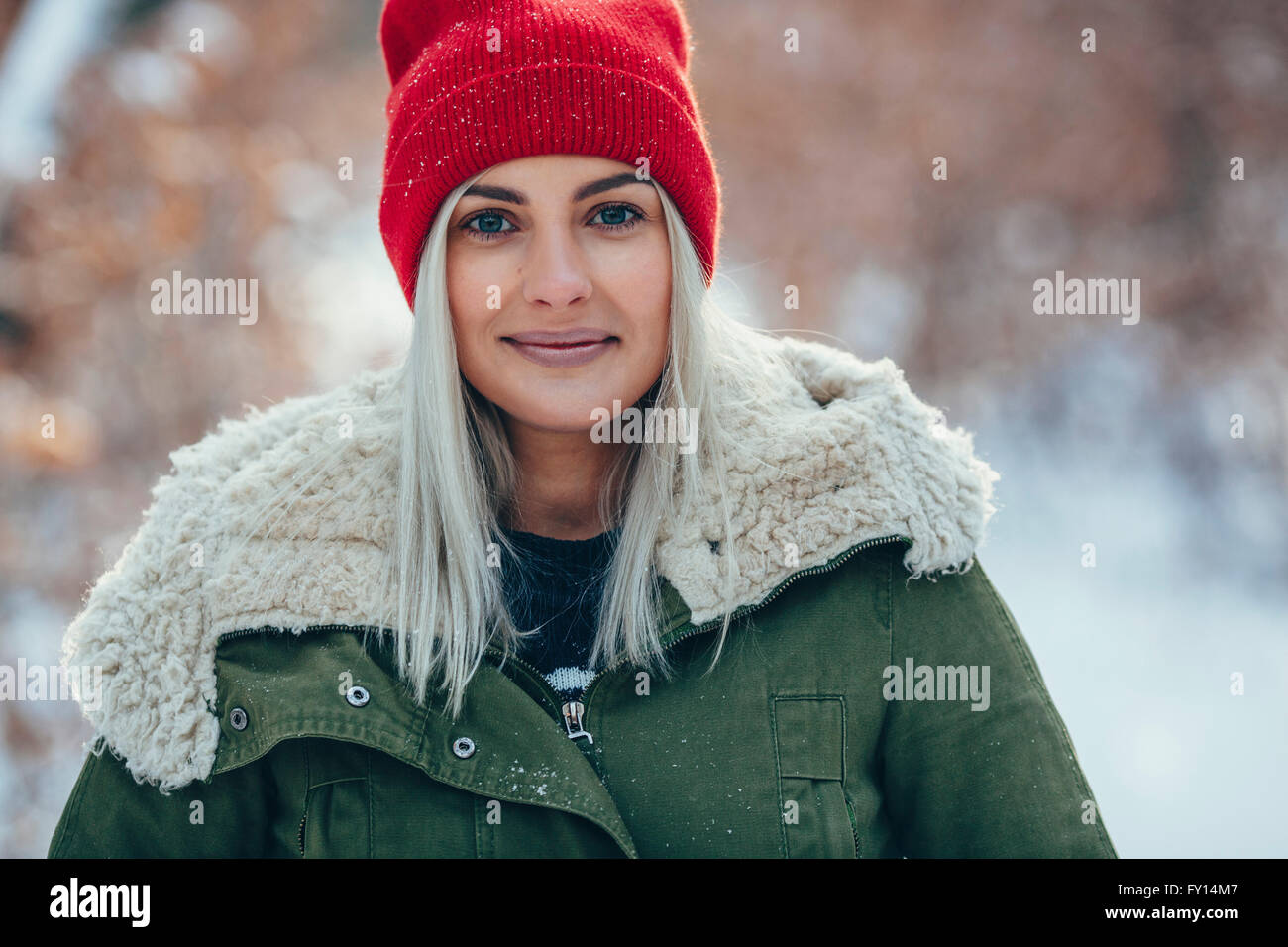 Woman standing outdoors hi-res stock photography and images - Alamy