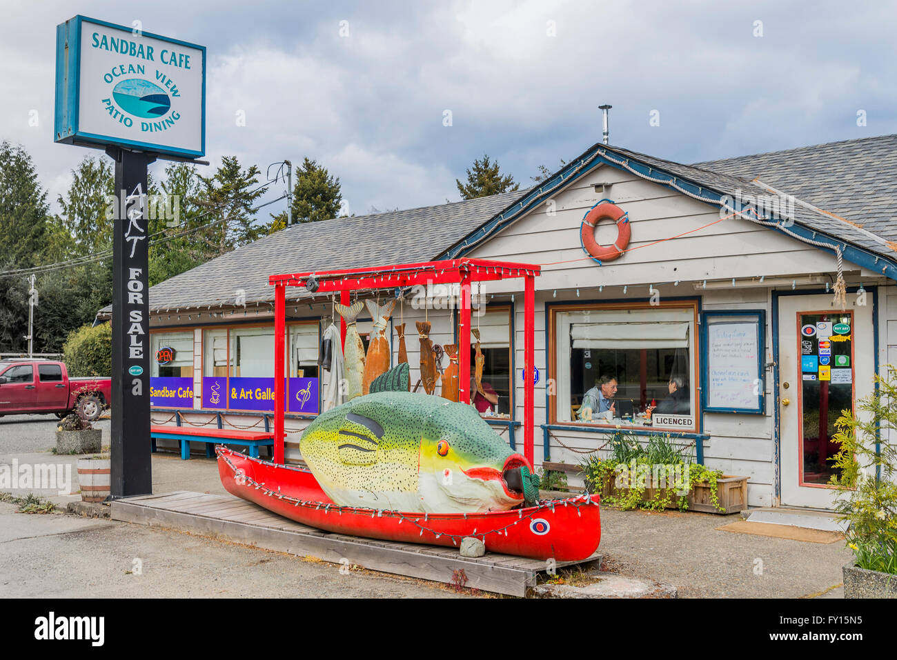 British columbia canada qualicum beach canoe fish folk art hires stock