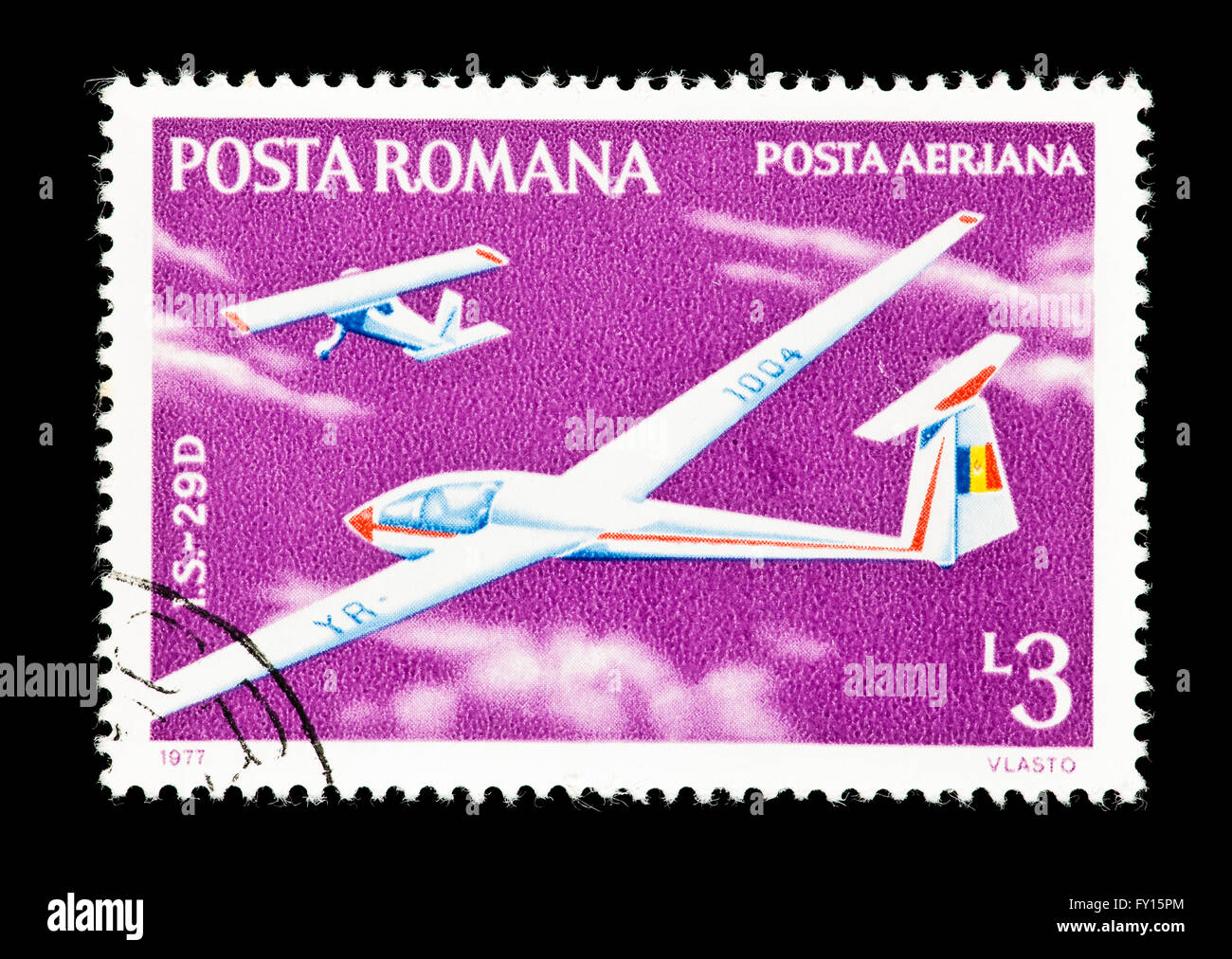 Postage stamp from Romania depicting an I.S-29D glider in flight. Stock Photo