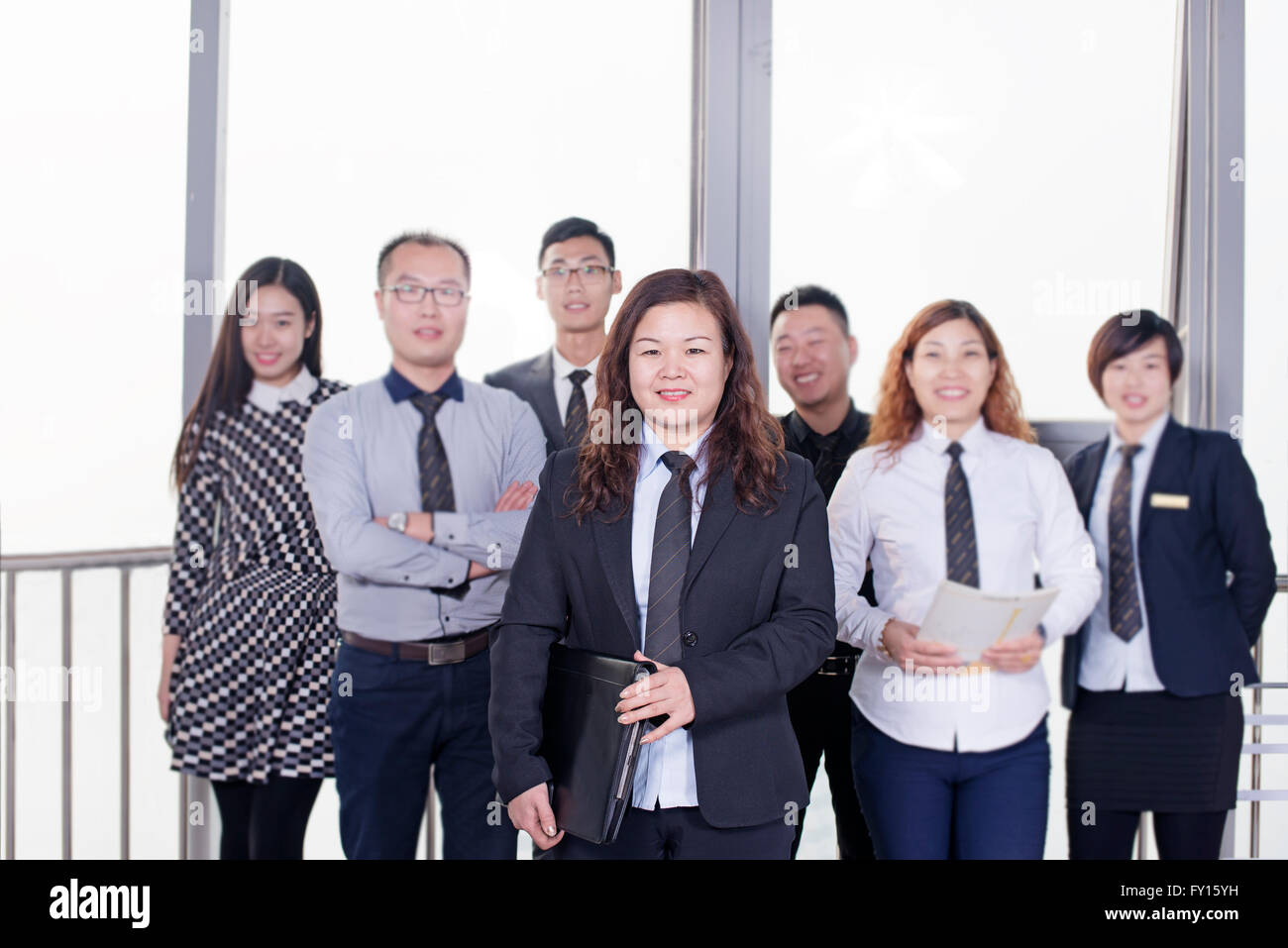 Confident business men and women.slightly shallow depth of field. Stock Photo