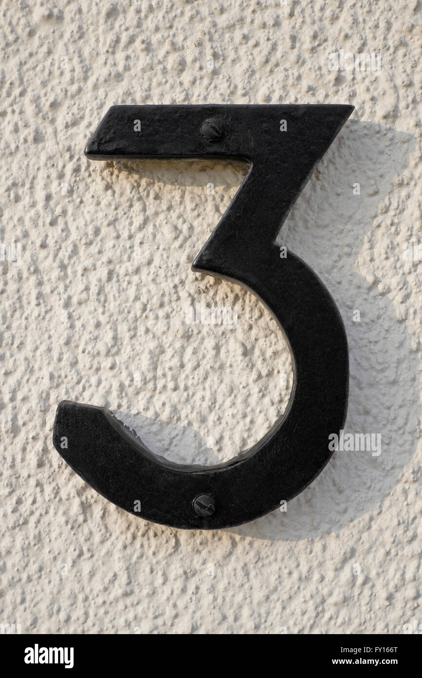 Number 3 on wall Stock Photo Alamy