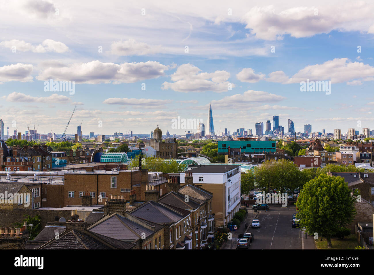 Residential area with flats in south London with a view of the city of London and its most iconic skyscrapers. Shot in Peckham, Stock Photo