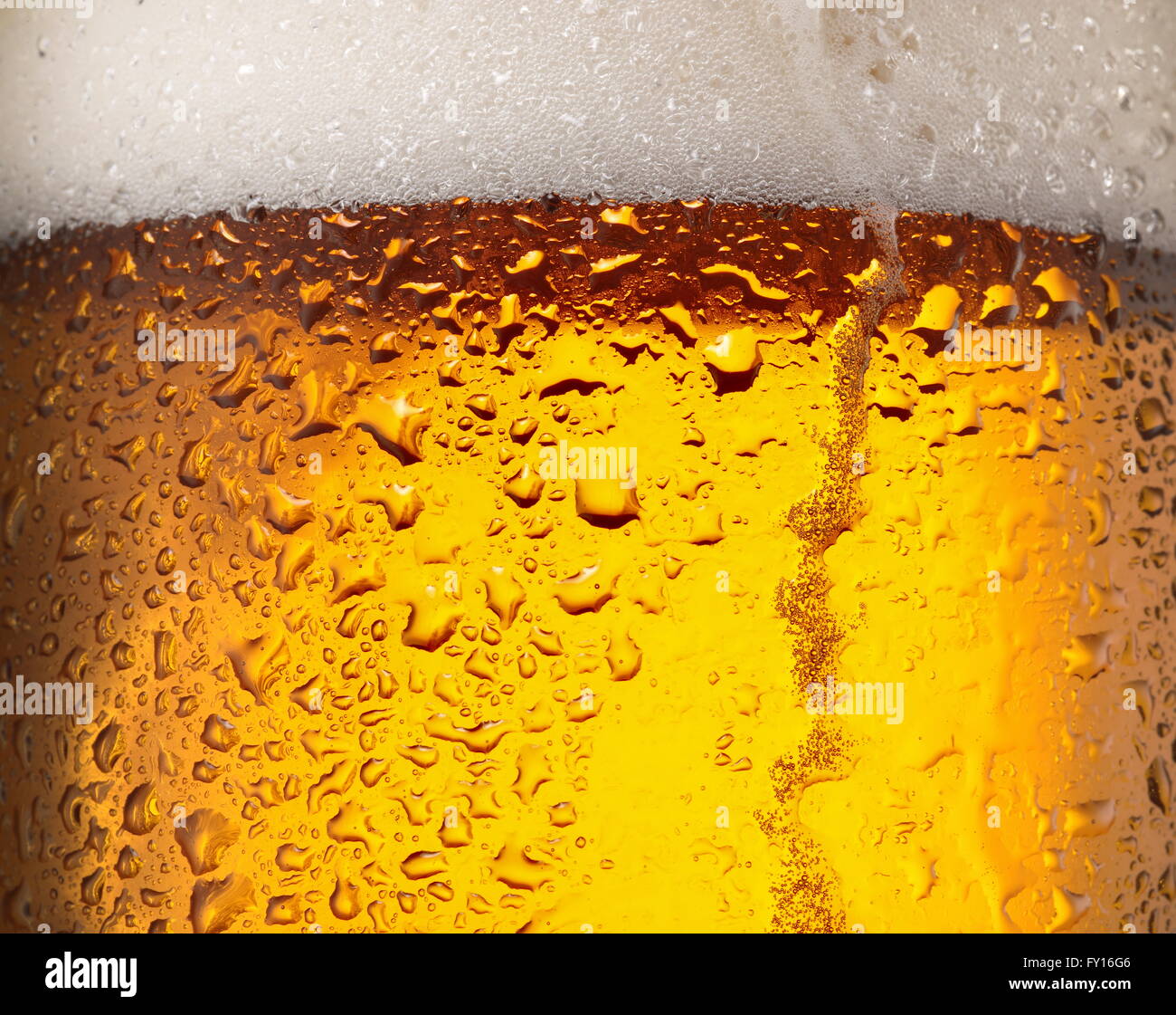 Water drops on glass of beer. Close up. Stock Photo