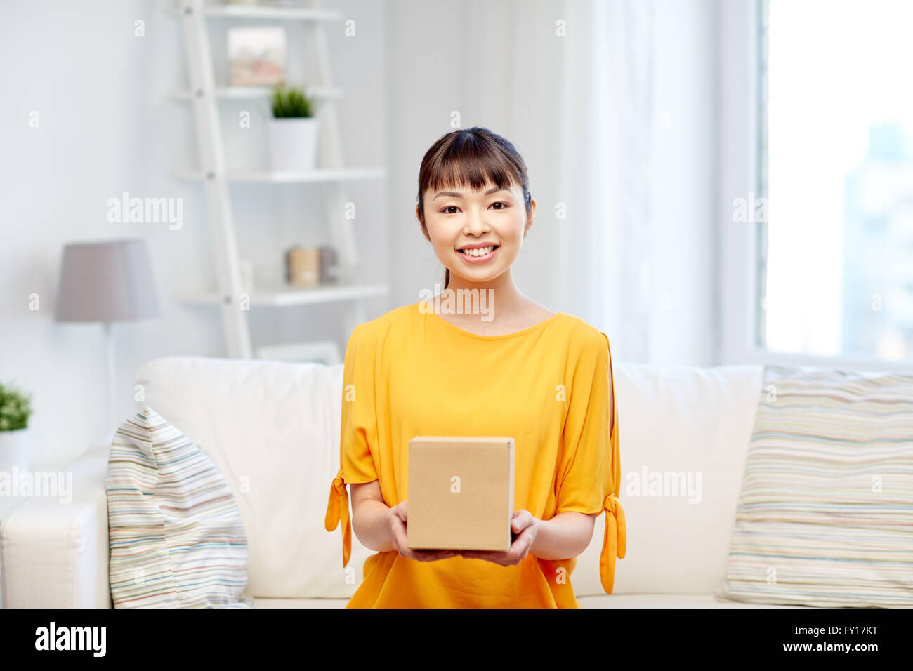 happy asian young woman with parcel box at home Stock Photo - Alamy