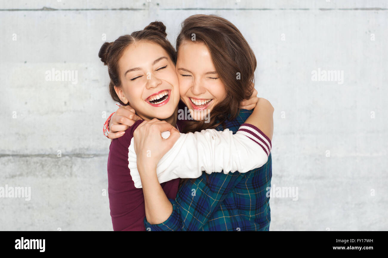 happy smiling pretty teenage girls hugging Stock Photo - Alamy