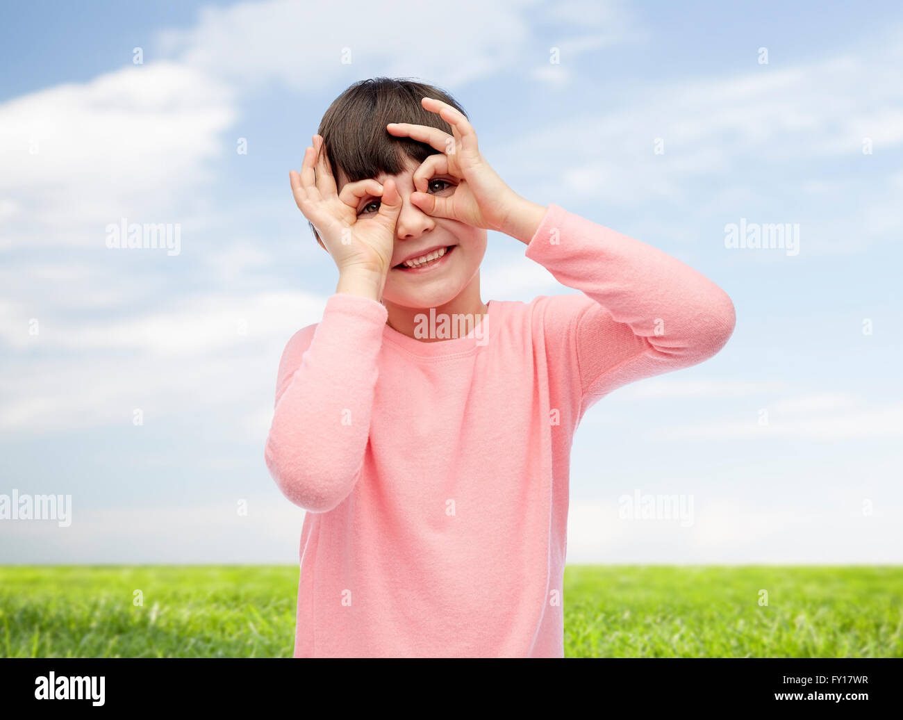 happy little girl making faces and having fun Stock Photo