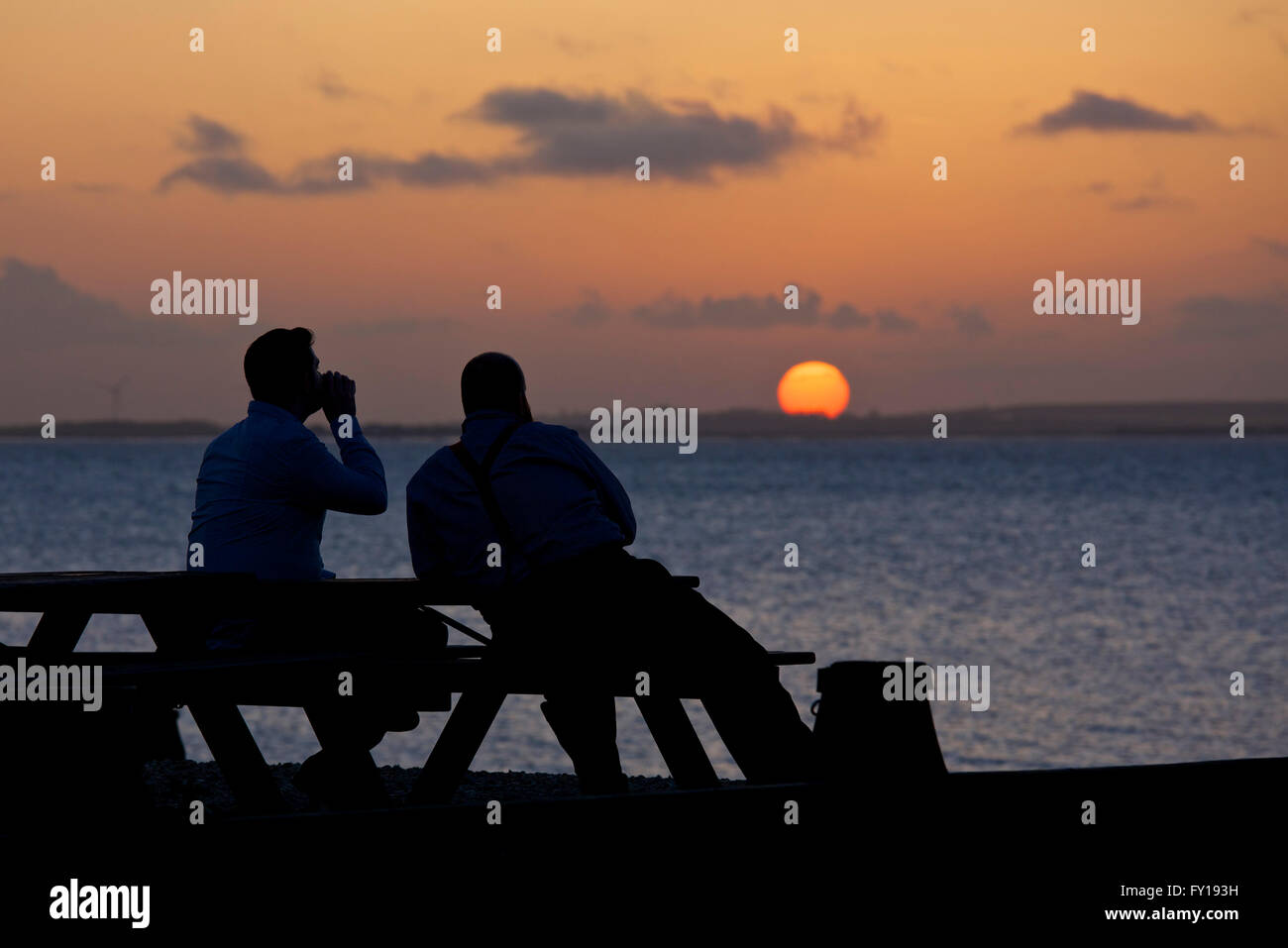 Whitstable, Kent, UK. 19th April 2016: UK Weather. Watching the sunset ...