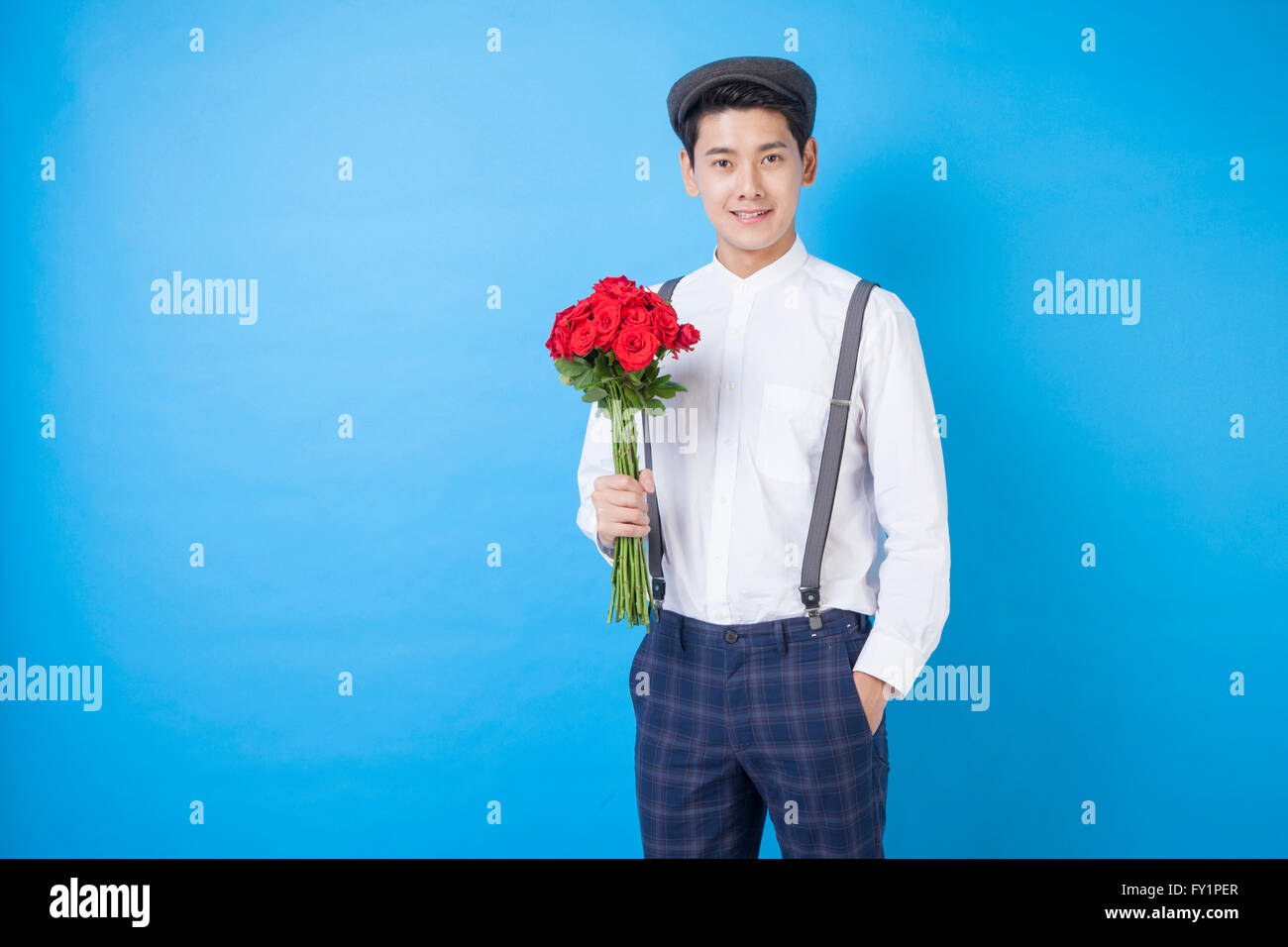 Man holding a bouquet of roses hi-res stock photography and images - Alamy