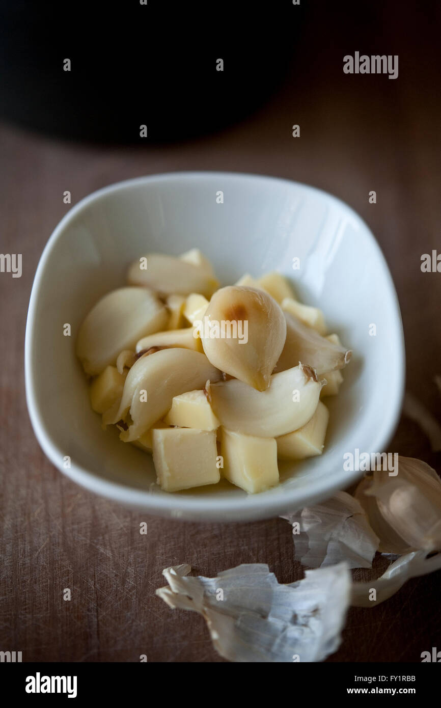 Roast Garlic and Butter in a bowl Stock Photo