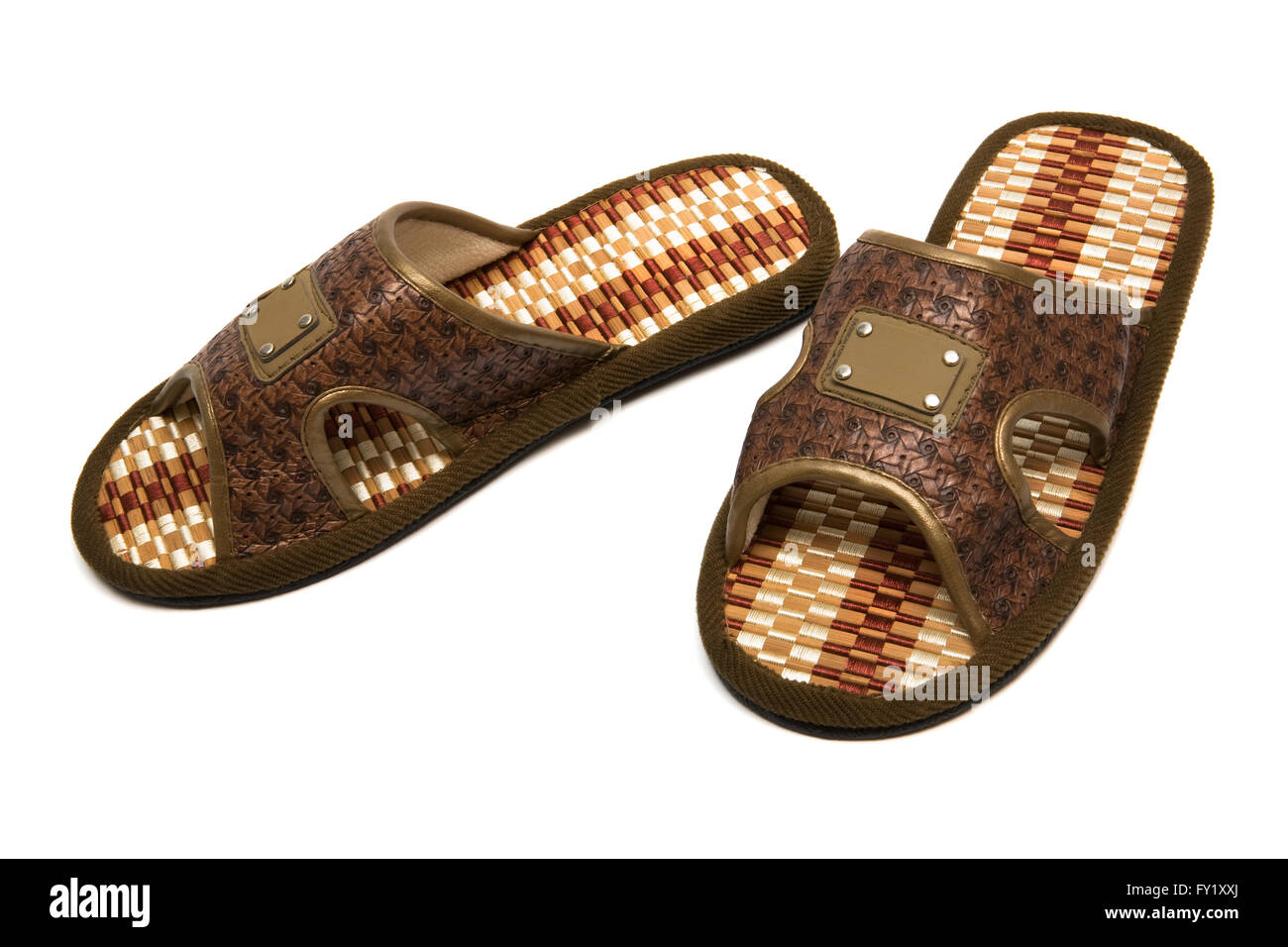 Beautiful brown slippers on a white background Stock Photo - Alamy