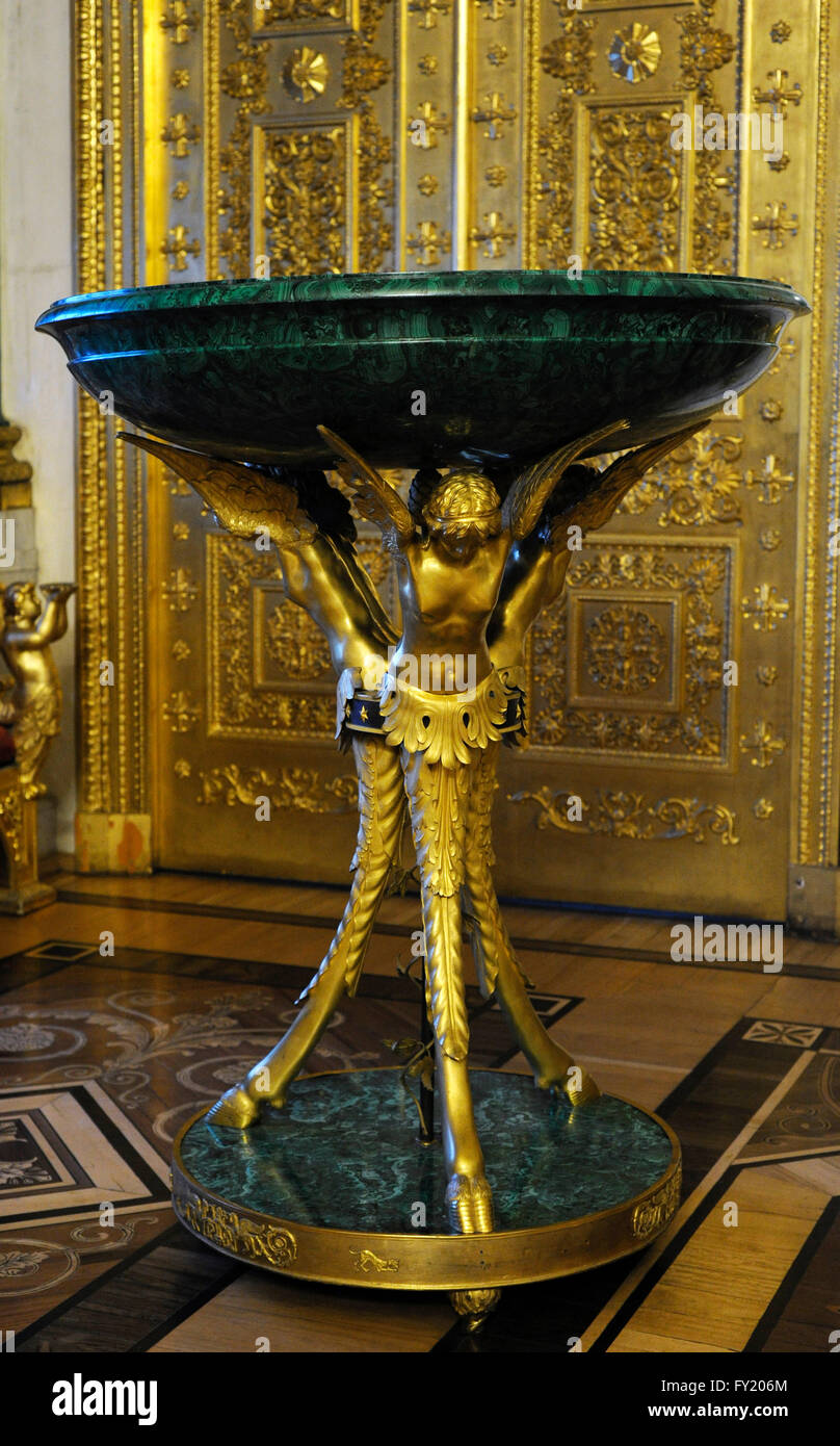Cup on Tripod in the Form of Winged Female Figures. 1890-1810 (?). The Peterhof Imperial Lapidary Works. Malachite and bronze. Russian Imperial Style. Malachite Room. The State Hermitage Museum. Saint Petersburg. Russia. Stock Photo