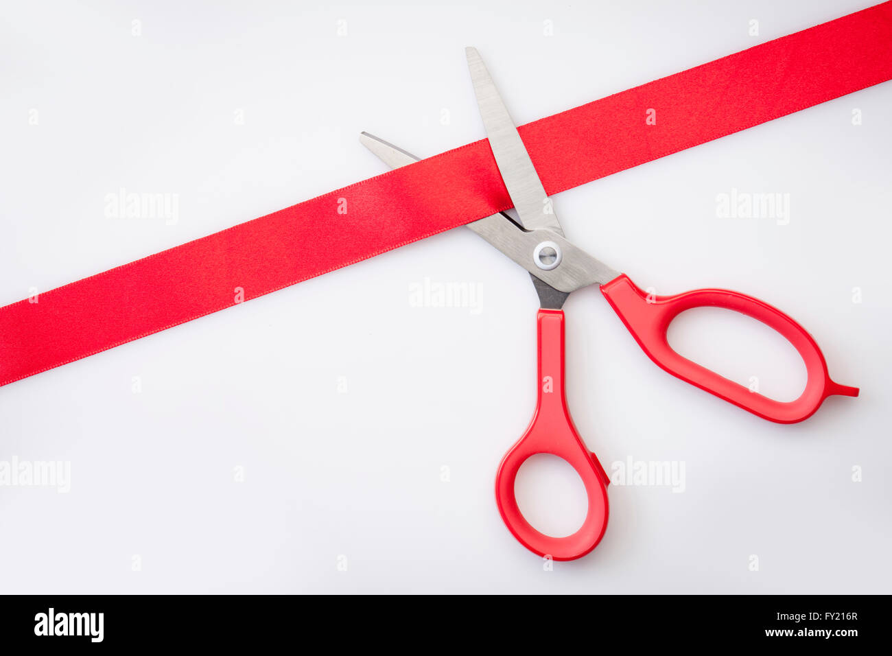 Red tape being cut Stock Photo Alamy