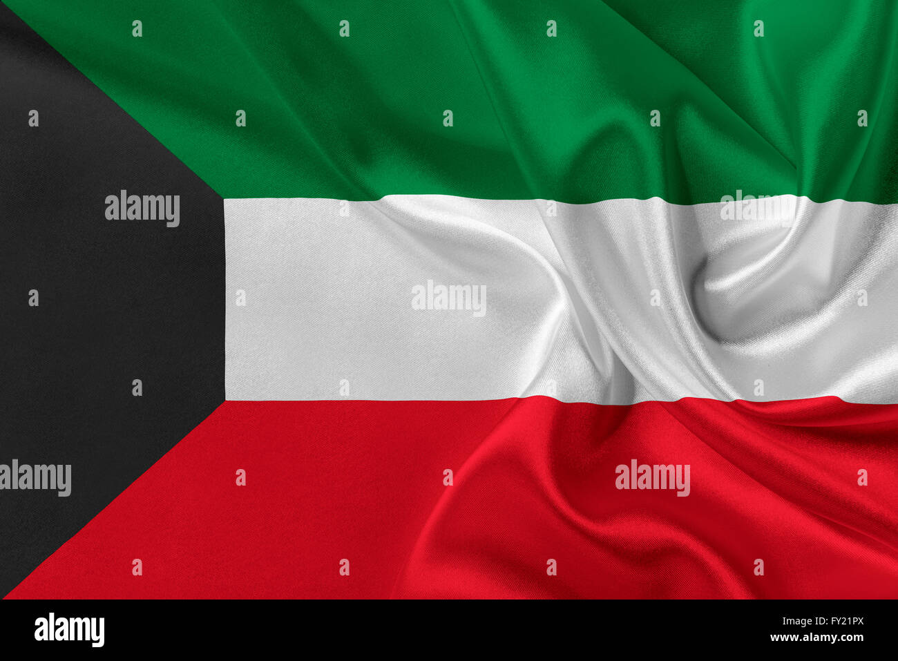 Flag of Kuwait waving in the wind. Stock Photo