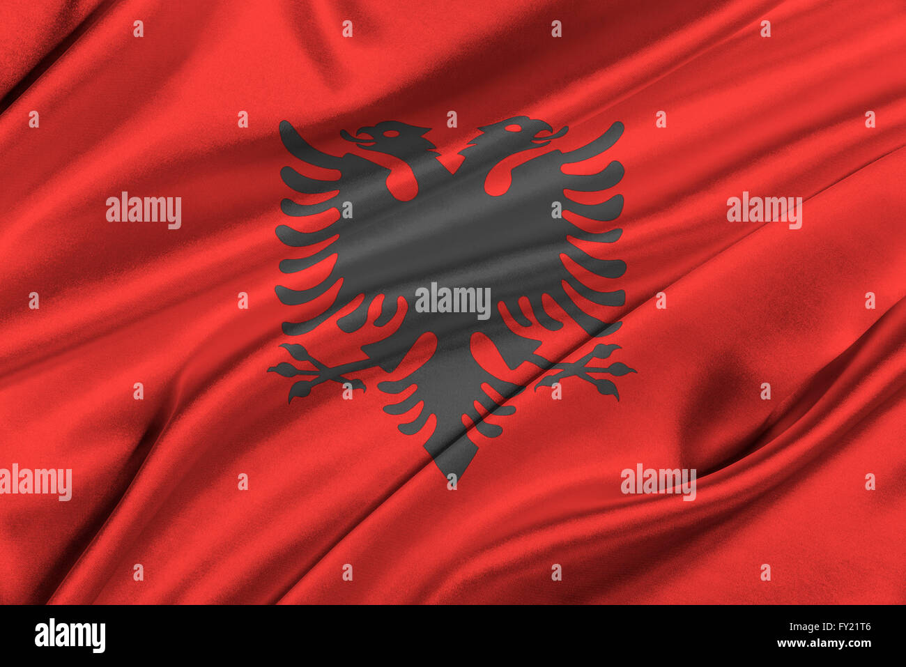Flag of Albania waving in the wind Stock Photo - Alamy