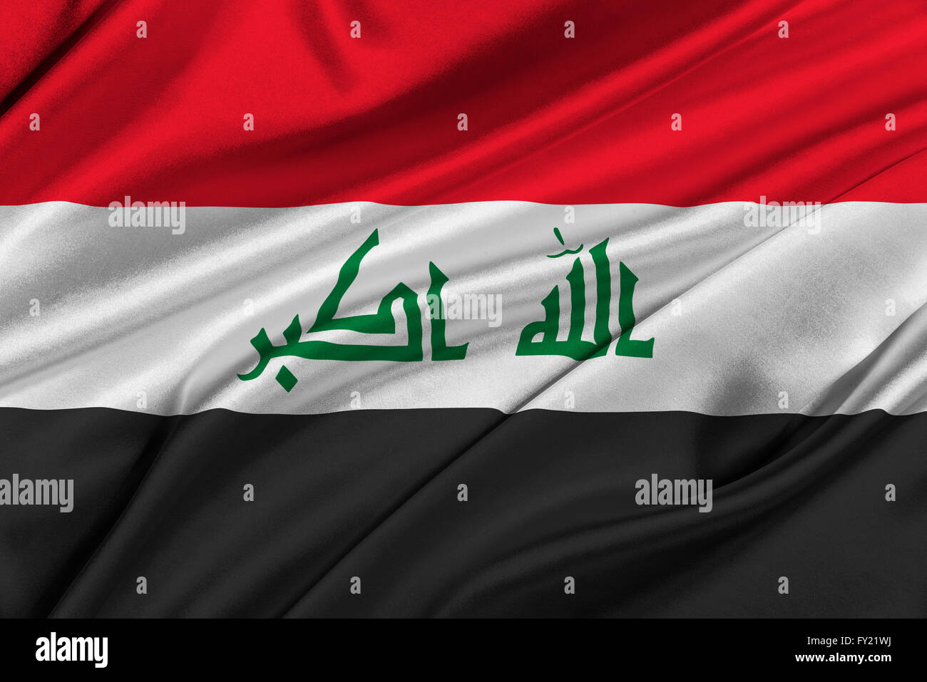 Flag of Iraq waving in the wind. Stock Photo