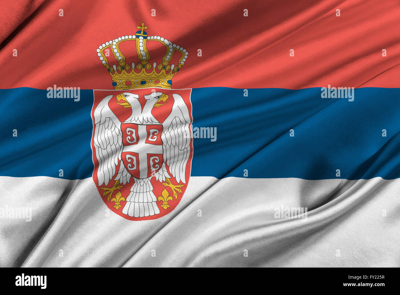 Flag of Serbia waving in the wind. Stock Photo