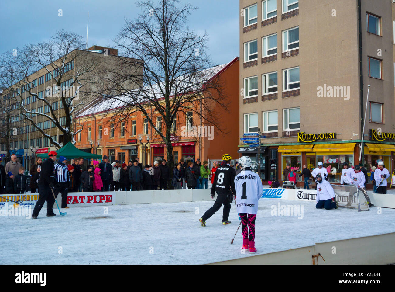 Floorball match on ice, during winter festival, Pori, Finland Stock Photo