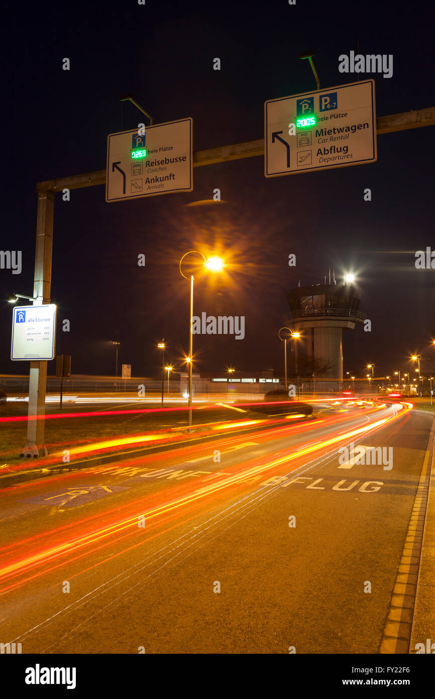 Light trails on the access road to Dortmund Airport 21, Dortmund, Ruhr Area, North Rhine-Westphalia, Germany Stock Photo