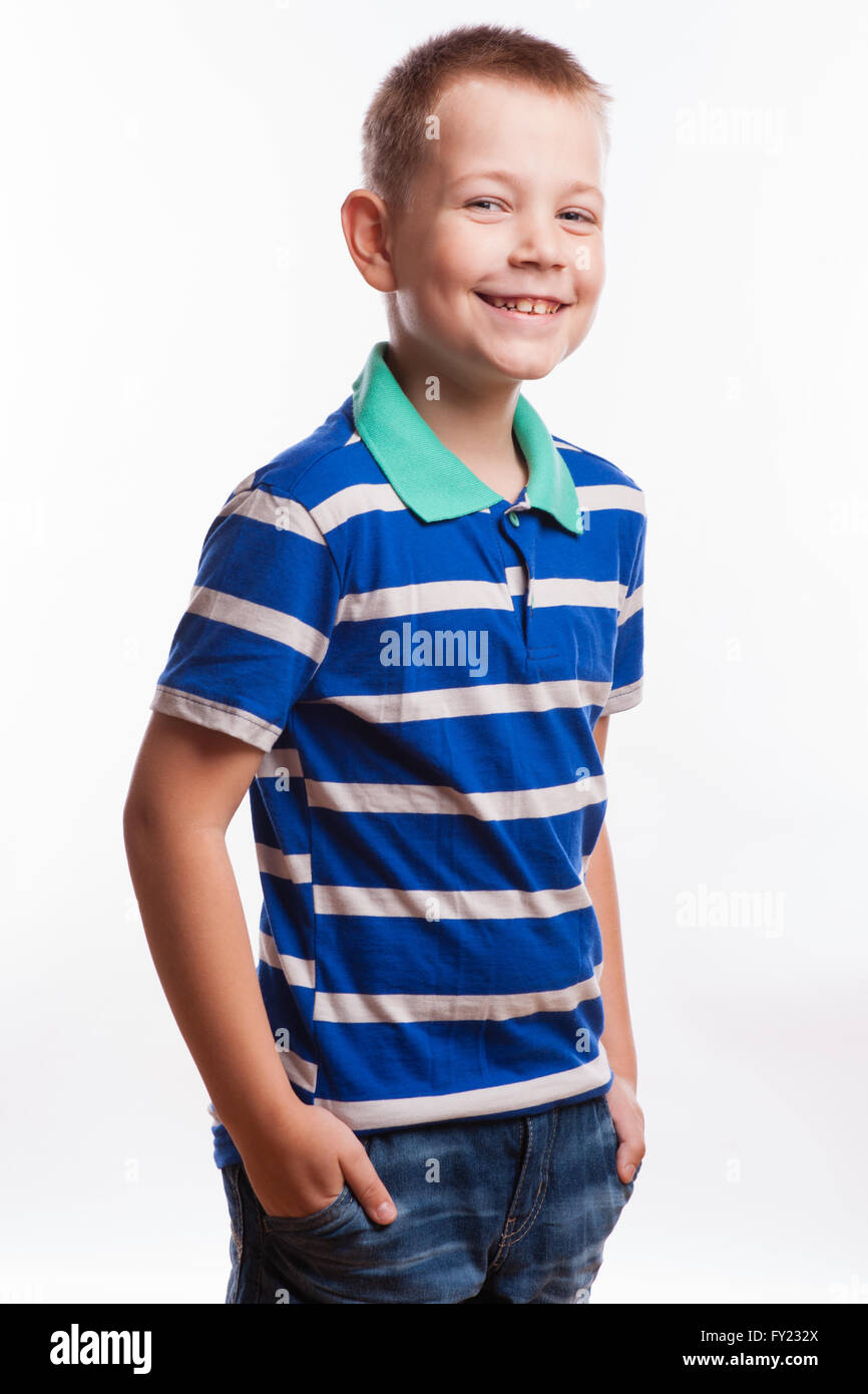 Young pretty boy posing at studio as a fashion model. Photo of