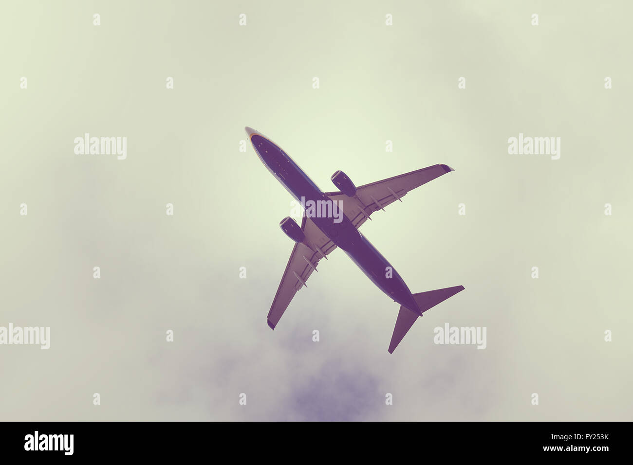 Passenger airplane directly above Stock Photo