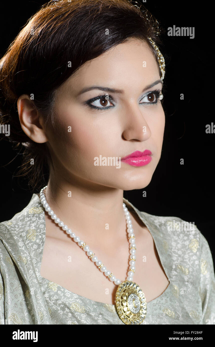 Face young serious asian woman hi-res stock photography and images - Alamy