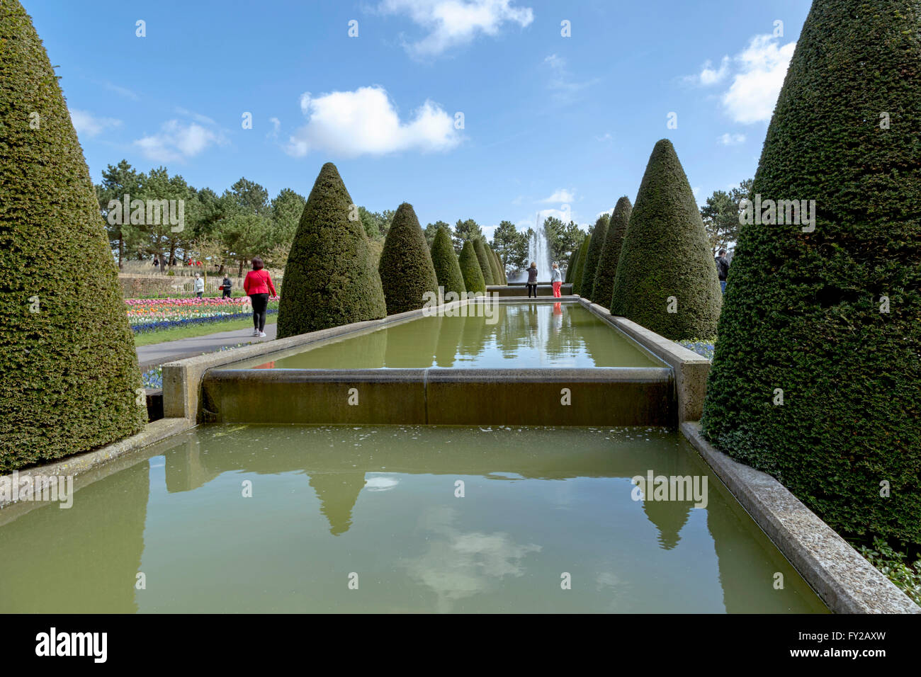 Topiary and fountain view at the famous Keukenhof, one of the world's largest flower gardens, Lisse, South Holland, Netherlands. Stock Photo