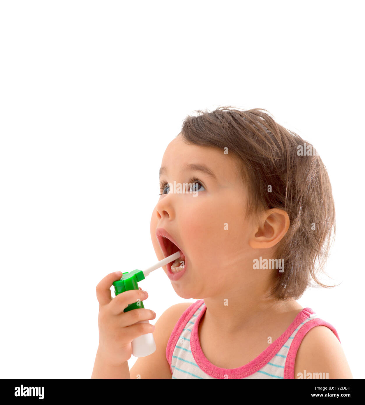 Little sick girl used medical spray for breath Stock Photo