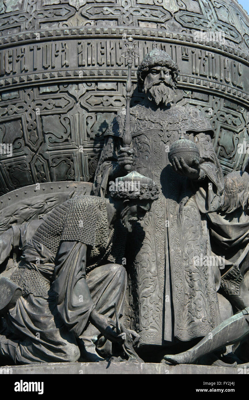 Grand Prince Ivan III of Moscow, also known as Ivan the Great. Detail of the Monument to the Millennium of Russia (1862) designed by Russian sculptor Mikhail Mikeshin in Veliky Novgorod, Russia. The statue of Ivan the Great represents the foundation of an independent Russian Tsardom (1491). Ivan the Great is depicted wearing dress of Byzantine emperors with the Monomach's Cap on his head and holding a sceptre and a globus cruciger in his hands. A Tatar kneeling beside Ivan the Great represents the expulsion of the Tatars after the Great Stand on the Ugra River (1480). Stock Photo