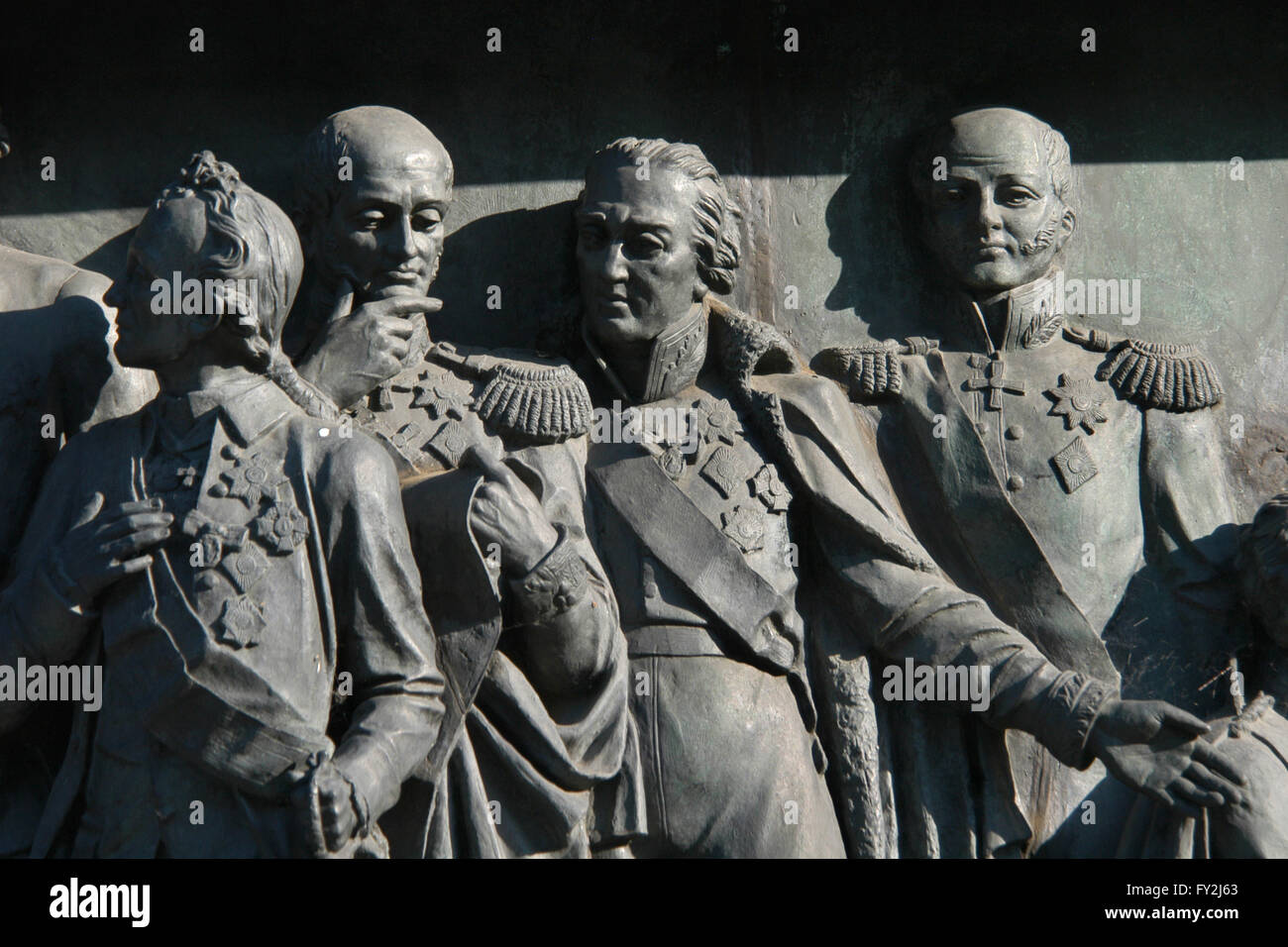 Russian Generalissimo Alexander Suvorov, Russian Field Marshal Michael Barclay de Tolly, Russian Field Marshal Mikhail Kutuzov and Russian Admiral Dmitry Senyavin depicted (from left to right) in the bas relief dedicated to Russian military leaders and heroes by Russian sculptors Matvey Chizhov and Alexander Lubimov. Detail of the Monument to the Millennium of Russia (1862) designed by Mikhail Mikeshin in Veliky Novgorod, Russia. Stock Photo