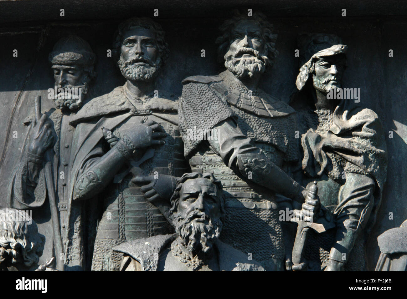 Prince Daumantas of Pskov, Grand Prince Alexander Nevsky of Kiev, Grand Prince Dmitry Donskoy of Moscow and Grand Duke Kestutis of Lithuania depicted (from left to right) in the bas relief dedicated to Russian military leaders and heroes by Russian sculptors Matvey Chizhov and Alexander Lubimov. Detail of the Monument to the Millennium of Russia (1862) designed by Mikhail Mikeshin in Veliky Novgorod, Russia. Prince Michael of Tver is depicted bellow. Stock Photo