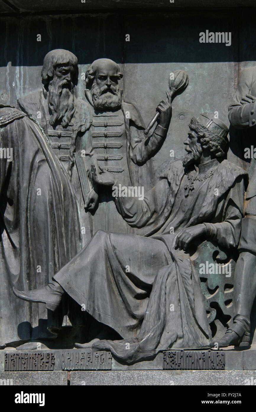 Tsar Alexis of Russia depicted in the bas relief dedicated to Russian statesmen by Russian sculptor Nikolai Laveretsky. Detail of the Monument to the Millennium of Russia (1862) designed by Mikhail Mikeshin in Veliky Novgorod, Russia. Russian statesmen Afanasy Ordin-Nashchokin (L) and Artamon Matveyev (R) are depicted standing in front of the tsar. Stock Photo