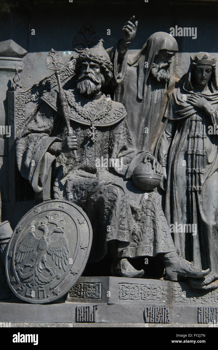 Grand Prince Ivan III of Moscow, also known as Ivan the Great, depicted in the bas relief dedicated to Russian statesmen by Russian sculptor Nikolai Laveretsky. Detail of the Monument to the Millennium of Russia (1862) designed by Mikhail Mikeshin in Veliky Novgorod, Russia. Russian statesman Protopope Silvester (L) and Anastasia Romanovna (R), the first wife of Ivan the Terrible, are depicted in the background in the right. Stock Photo