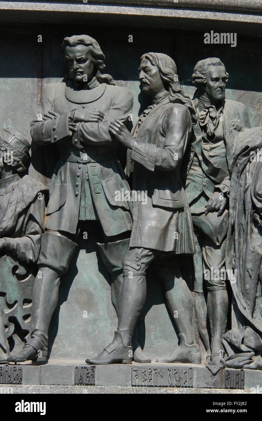 Tsar Peter the Great of Russia (L) and his advisor Yakov Dolgorukov (R) depicted in the bas relief dedicated to Russian statesmen by Russian sculptor Nikolai Laveretsky. Detail of the Monument to the Millennium of Russia (1862) designed by Mikhail Mikeshin in Veliky Novgorod, Russia. Russian statesman Ivan Betskoy is depicted in the background in the right. Stock Photo