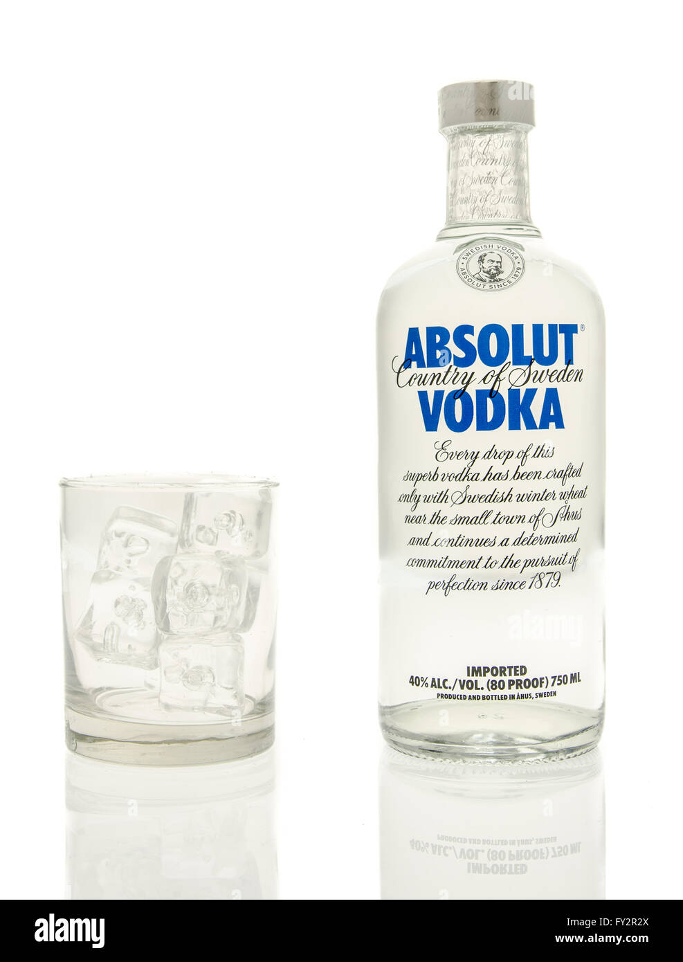 Winneconne, WI - 15 March 2016:  A bottle of Absolut vodka with a glass of ice Stock Photo