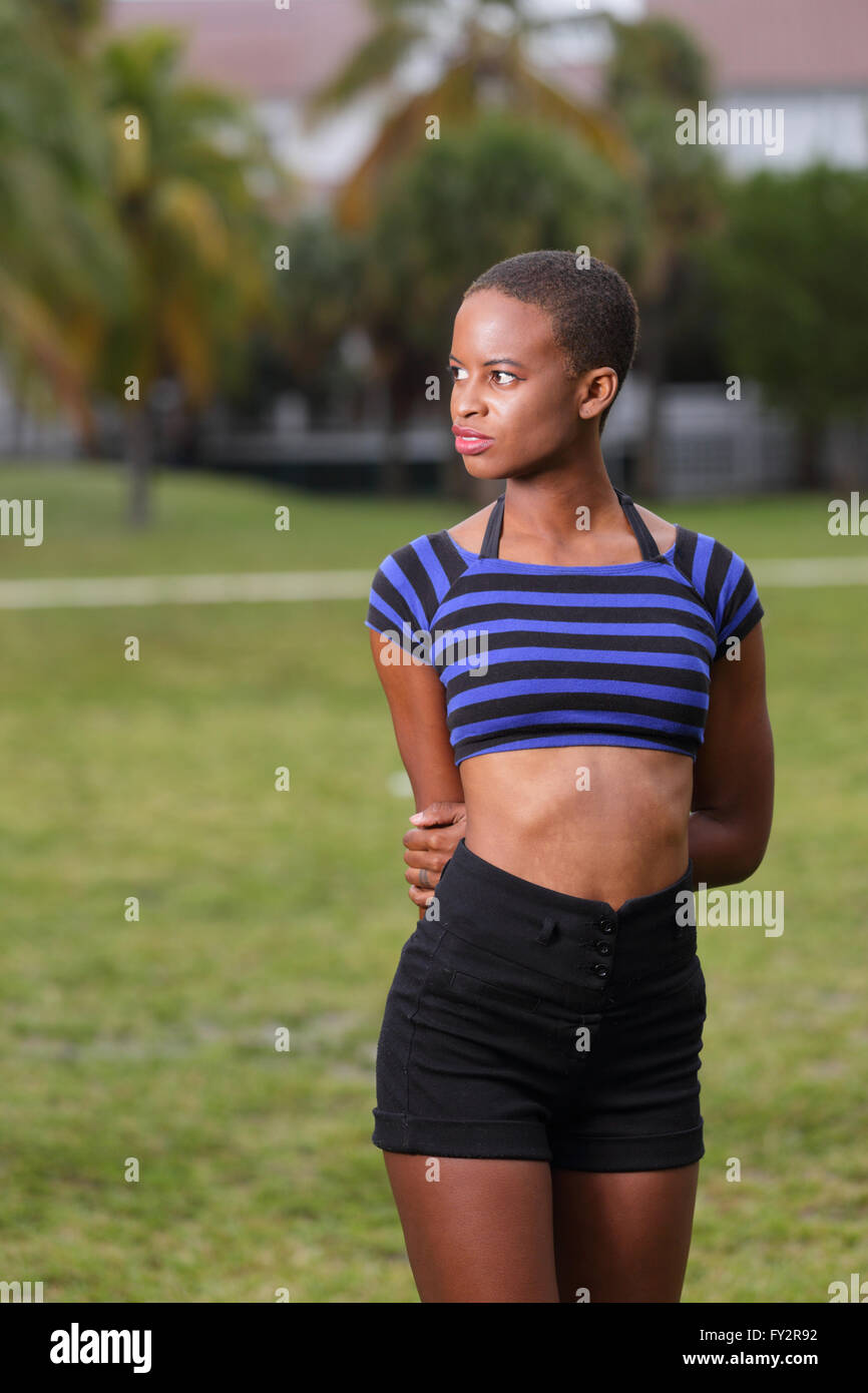 Woman with arms behind her back Stock Photo Alamy