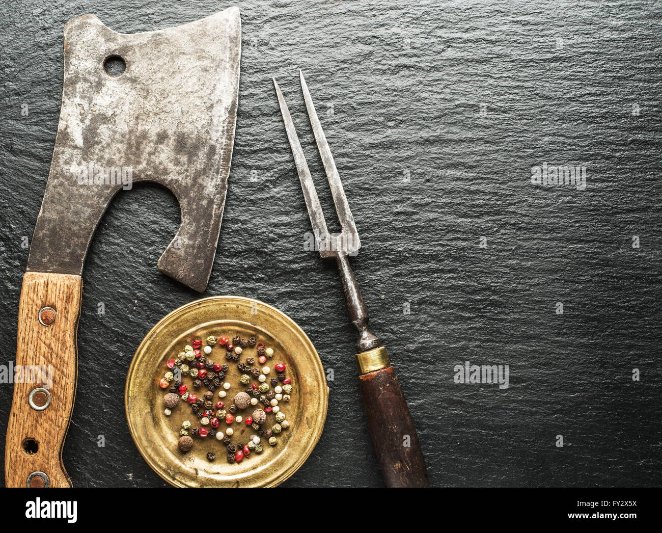 Kitchen utensils on the graphite background. Stock Photo