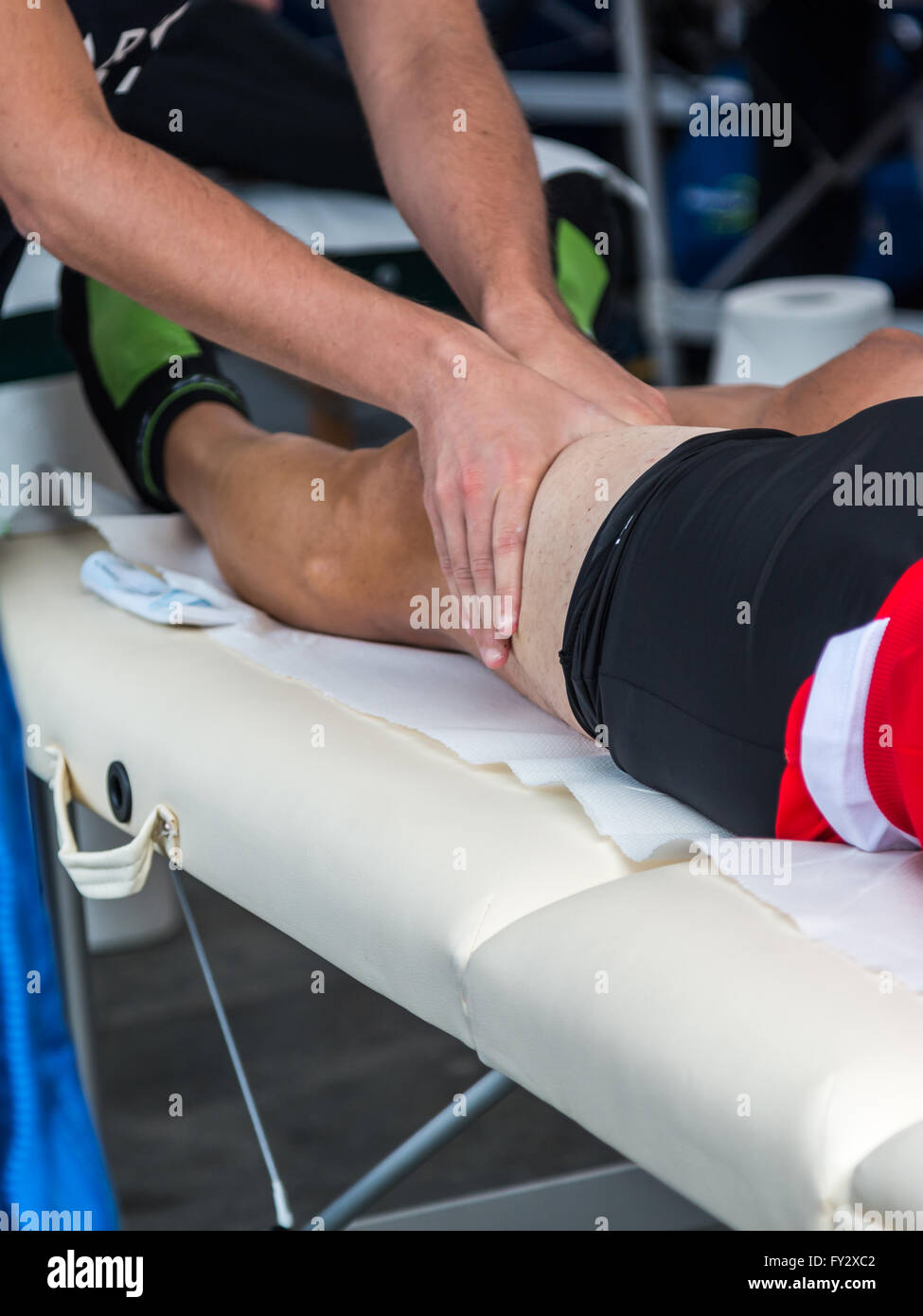 Athlete's Quadriceps Muscle Professional Massage Treatment after Sport