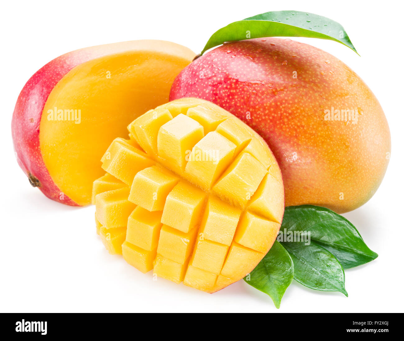 Mango cubes and mango fruit. Isolated on a white background. Stock Photo