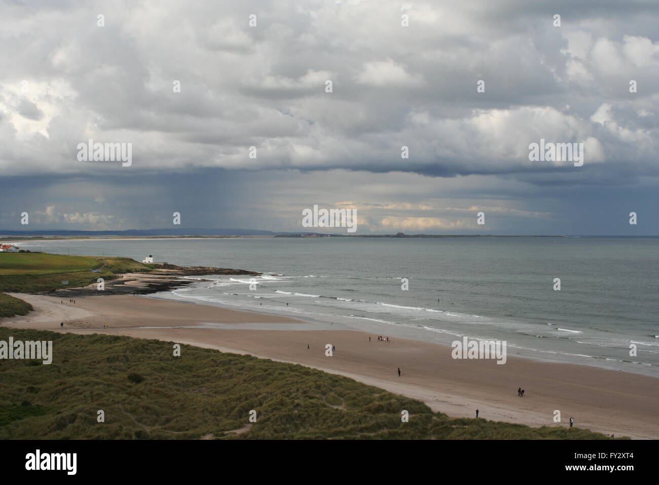 Rain over Lindisfarne Stock Photo - Alamy