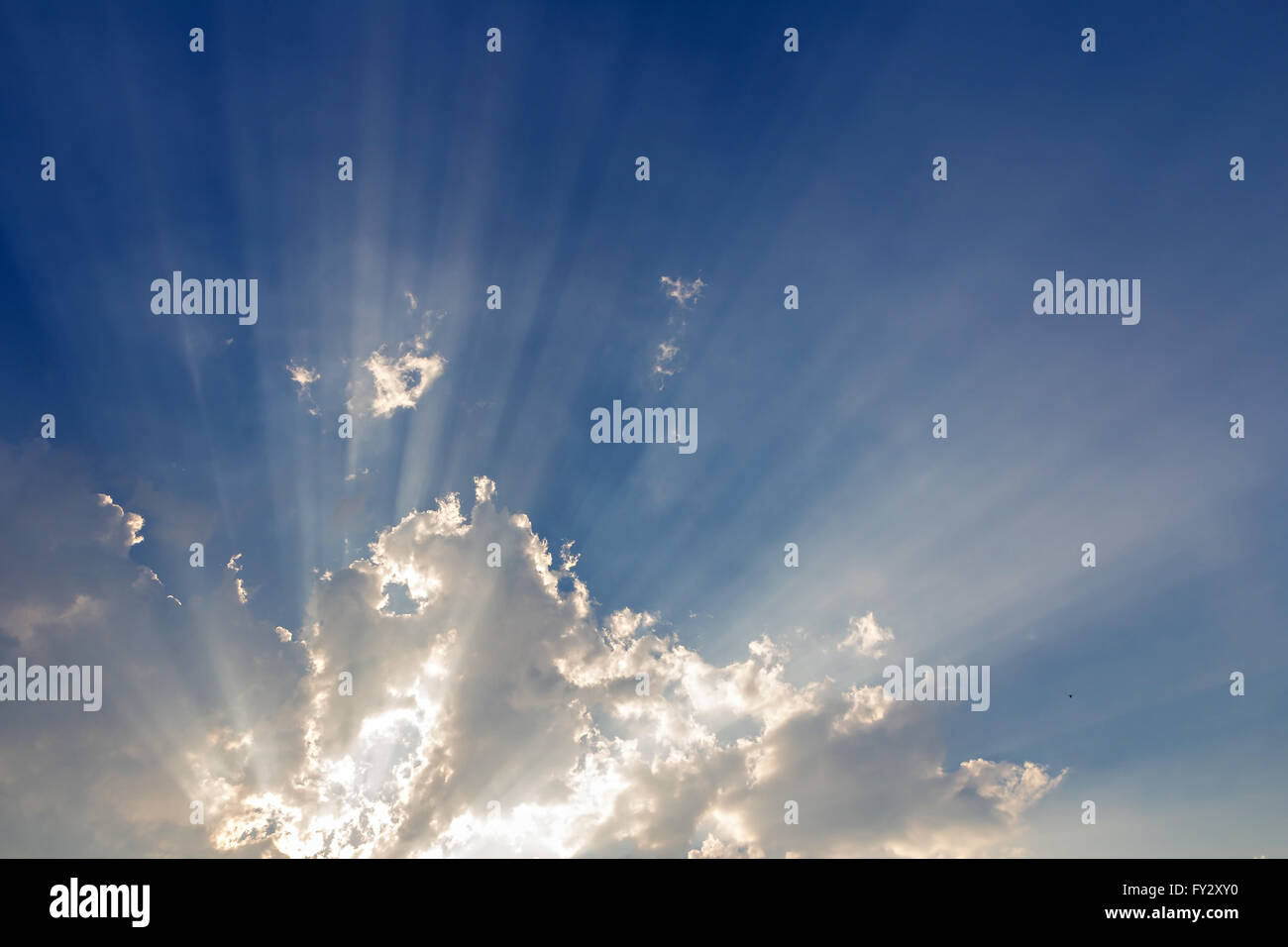 Clouds on blue sky background and sun ray Stock Photo - Alamy
