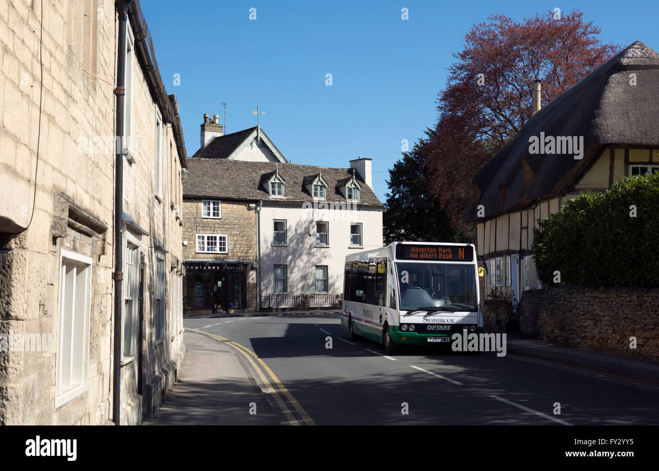 Deep Street with local bus service, Prestbury, Gloucestershire, England, UK Stock Photo