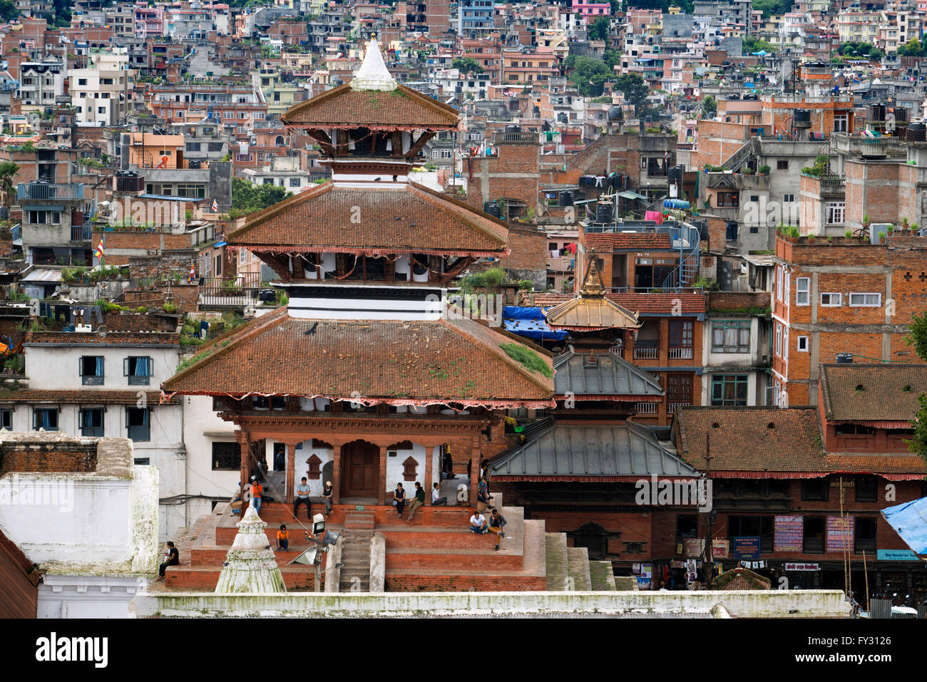The Maju Deval temple, Durbar square, Kathmandu,  Nepal. Three-storey Nepalese pagoda, architecture of the Newar, right Shiva te Stock Photo