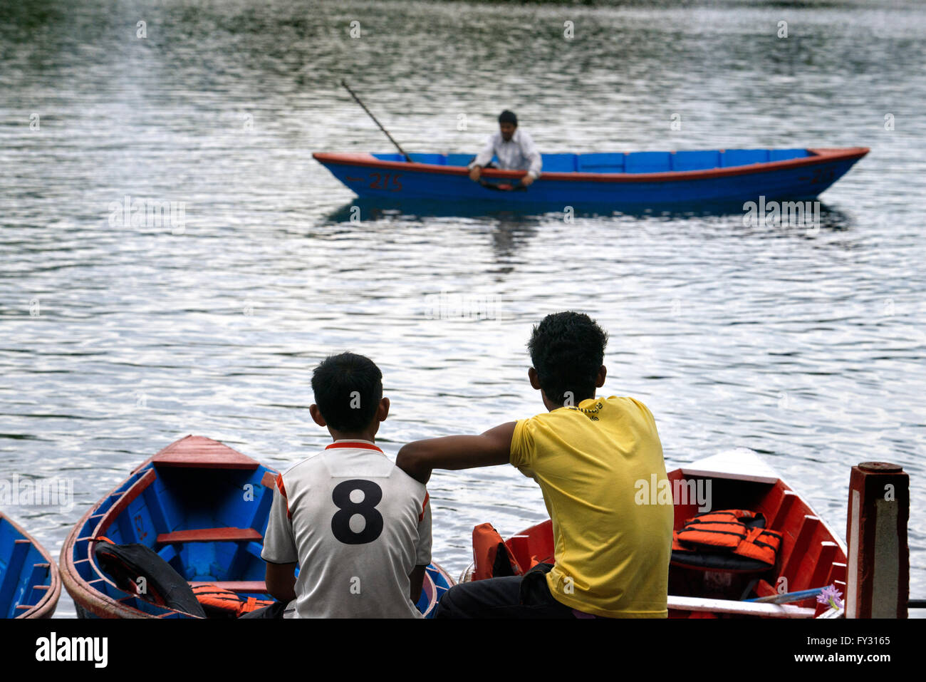 Tourists boat on Lake Phewa, South of Pokara, Nepal Stock Photo