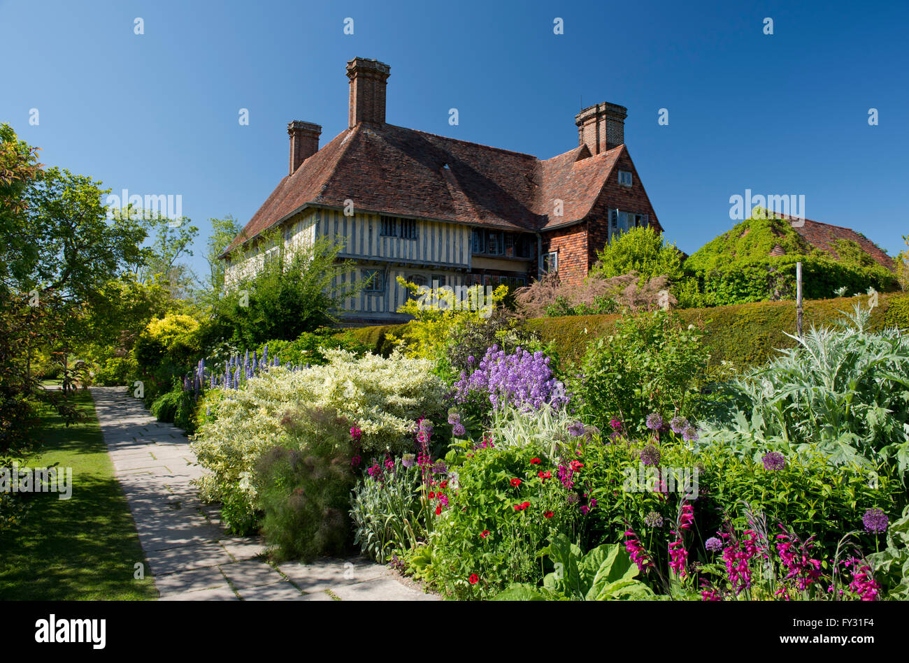 Phlox, Gladolilus, Allium and Papaver in the Long Border at Great Dixter. Stock Photo