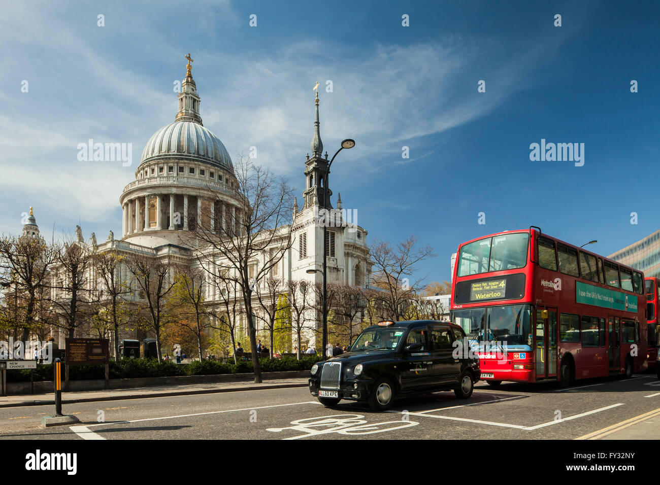 Iconic London cab and double decker bus in front of St Paul's Cathedral, England. Stock Photo