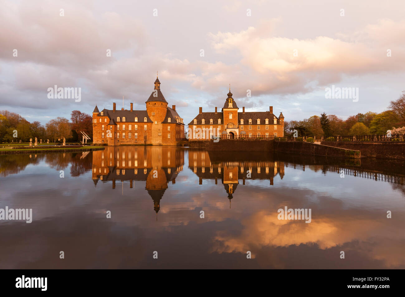 Castle Anholt at Isselburg in the Lower Rhine region at sunset Stock Photo