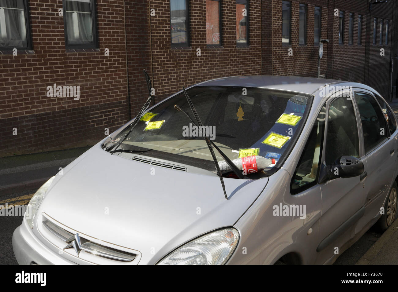 Abandoned car with multiple parking fines in Sheffield England Stock Photo