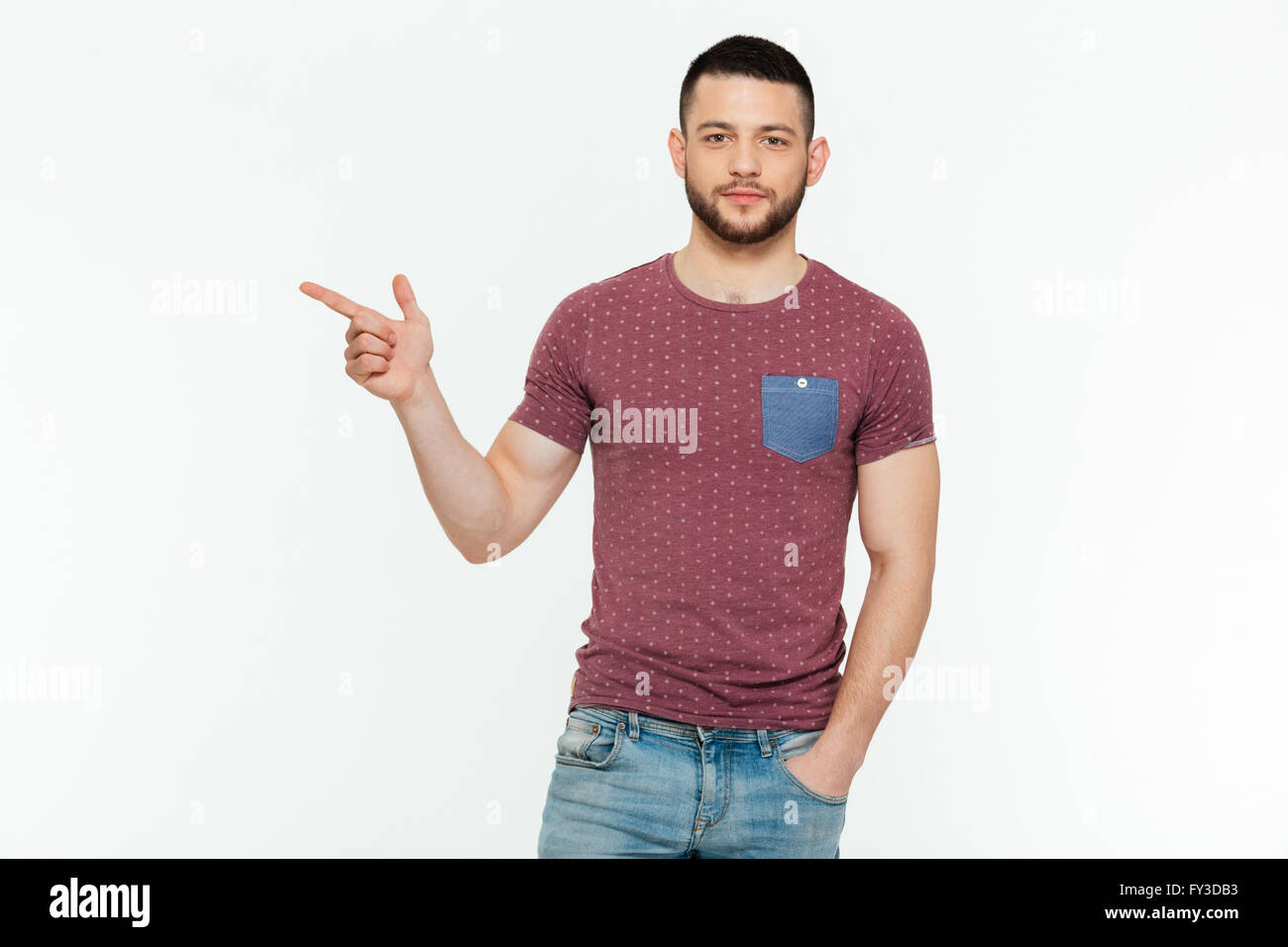Casual man pointing finger away isolated on a white background Stock ...