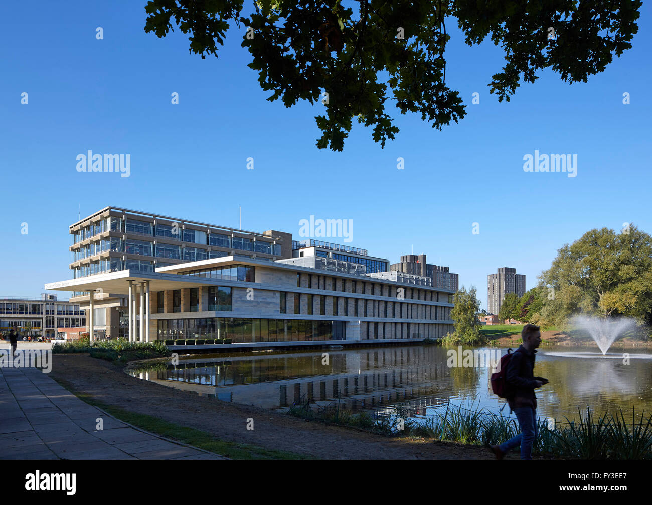 Overall view over lake. Albert Sloman Library and Silberrad Student Centre University of Essex, Colchester, United Kingdom. Architect: Patel Taylor , 2015. Stock Photo